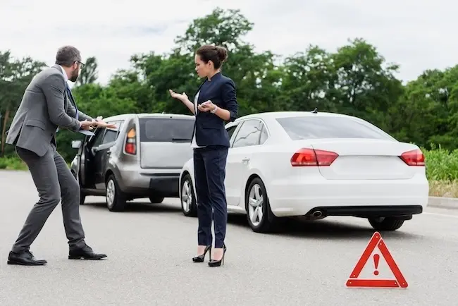 GMV Law Group Atlanta car accident lawyer consulting with client about winning case with no witnesses using physical evidence